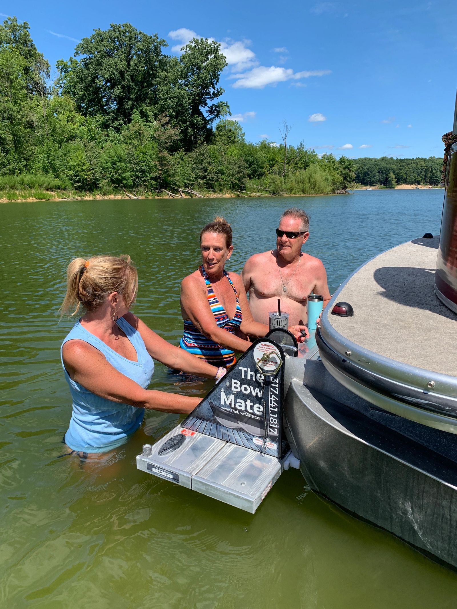 Family entertaining guests on The Bow Mate platform
