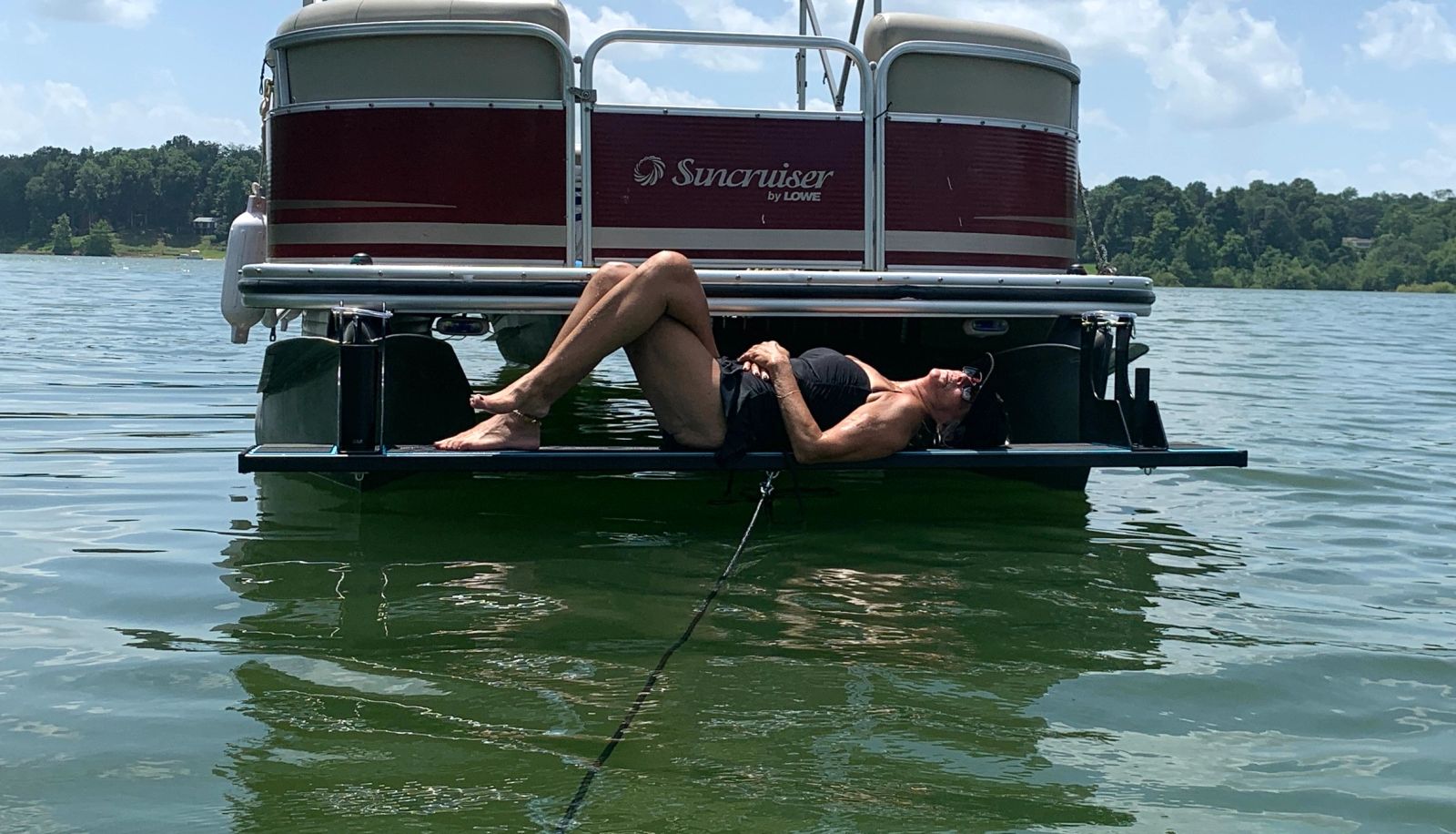 Tan and lay at water level on The Bow Mate