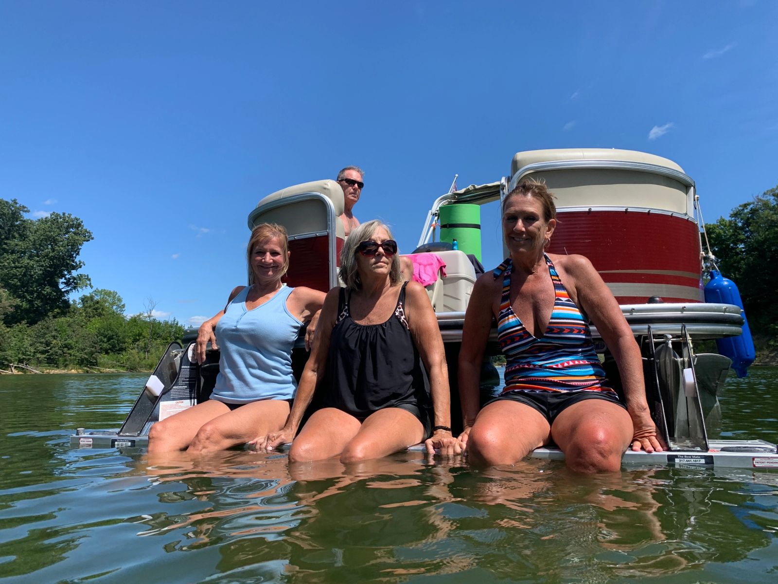 Why we created The Bow Mate - family on pontoon at water level